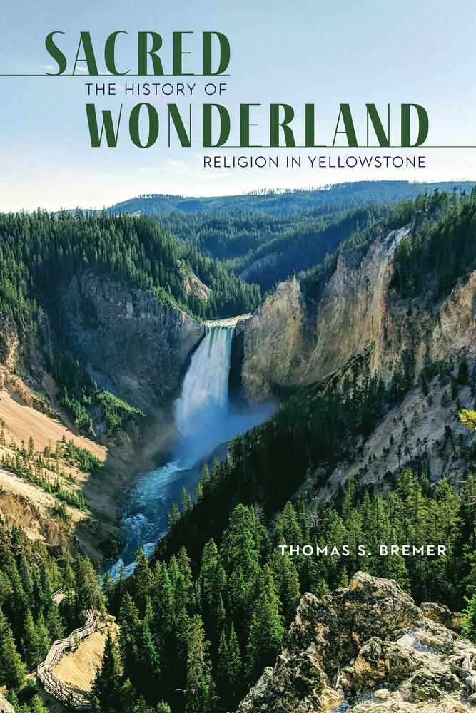 Book cover with an image of a waterfall in a large canyon. Title reads Sacred Wonderland the history of religion in Yellowstone Thomas S. Bremer.